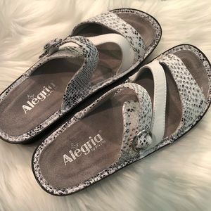 Alegria slip on sandal size 39. White snakeskin look.